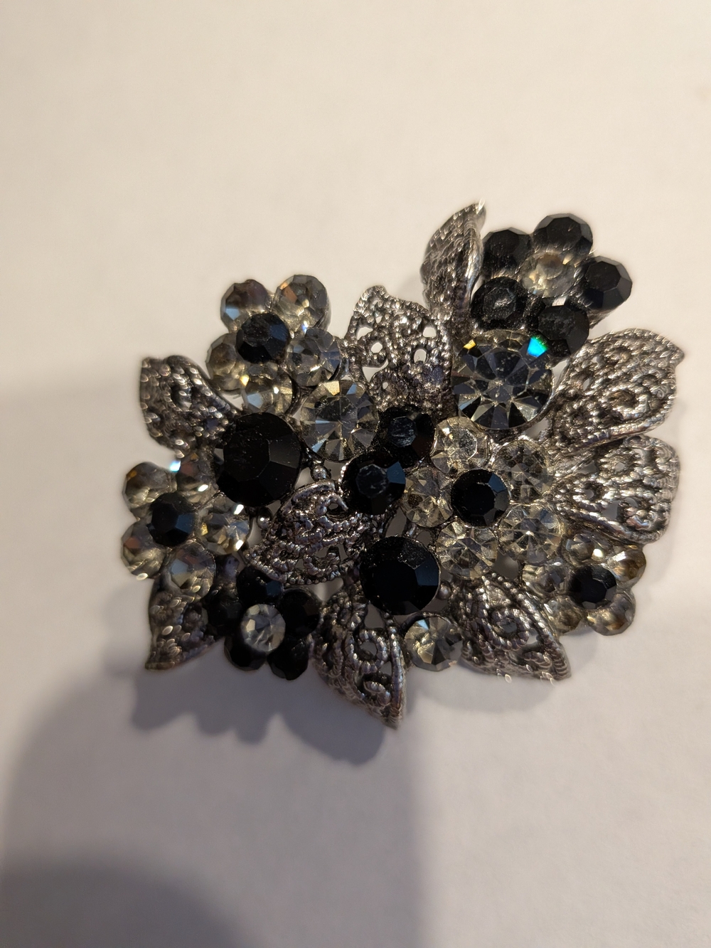 Vintage 1950s Crystal Floral Filigree Brooch- Black and Silver Sparkle